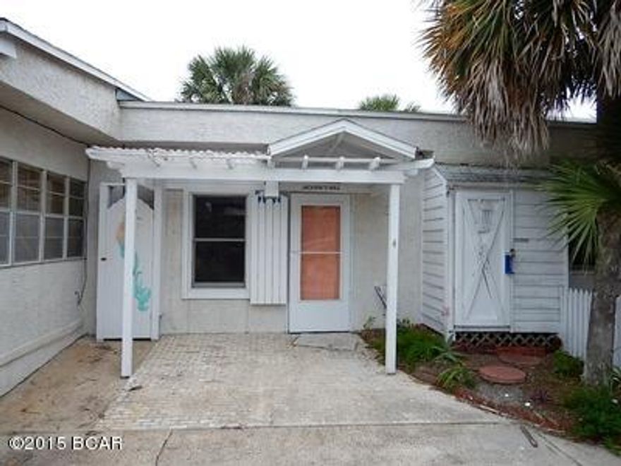 Adorable Beachside cottage with ocean view from top deck. All new appliances in kitchen, unit has two bedrooms with tile throughout. Great value for ocean side property!! All Information recorded in the MLS is intended to be accurate but cannot be guaranteed, buyer advised to verify. Sold As-Is.