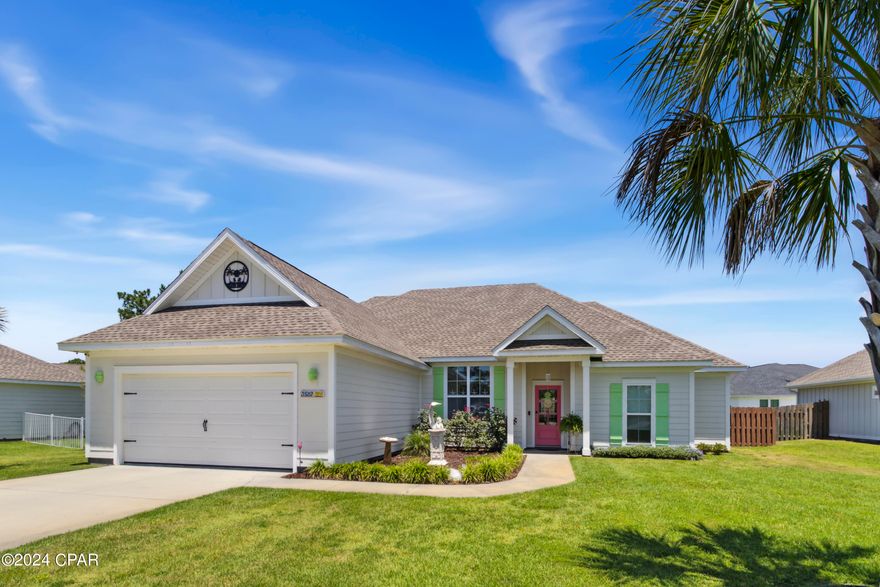 Discover the charm of this stunning 3-bedroom, 2-bathroom home nestled in the sought-after Southgate Subdivision. Located on an X Flood Zone lot, this residence offers peace of mind and is just minutes away from the vibrant heart of downtown Port St. Joe, where you can indulge in top-tier dining and a variety of retail shopping options. Inside, the home boasts exquisite EVP flooring that exudes elegance and durability. The modern kitchen is a chef's delight, featuring sleek granite countertops and premium Samsung stainless steel appliances. Enhancing the home's appeal, it includes a cozy gas fireplace perfect for relaxing evenings, a well-maintained fence ensuring privacy, and a well for efficient irrigation. Outdoor enthusiasts will love the stone patio, ideal for entertaining, and the screened-in porch that provides a serene spot to enjoy the outdoors without the bugs. Additional storage solutions are provided by the shelving in the garage, making organization a breeze. This beautiful home is a perfect blend of style and convenience, promising a lifestyle of comfort and luxury. Don't miss the opportunity to make it yours!