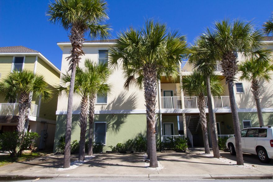 Bonita Point Condos is a great water front community on the lagoon with boating access to the Gulf of Mexico. This 1,200 square foot 2 bedroom 2 bath unit is in great condition. The unit comes with tile, carpet, corian counter tops, a new AC unit with 10 year transferable warranty and new roof. This desirable down stairs unit has a spacious open floor plan with beautiful views and stairs to the lagoon. Enjoy relaxing on your balcony soaking in the warm Florida breeze while watching the pelicans soar above the water. Bonita Point has a great covered boat house with automatic boat lifts for rent, and a community pool to enjoy taking a dip after a day at the beach. Bonita Point is located close to the beautiful beaches of Panama City Beach, entertainment, shopping and local restaurants.