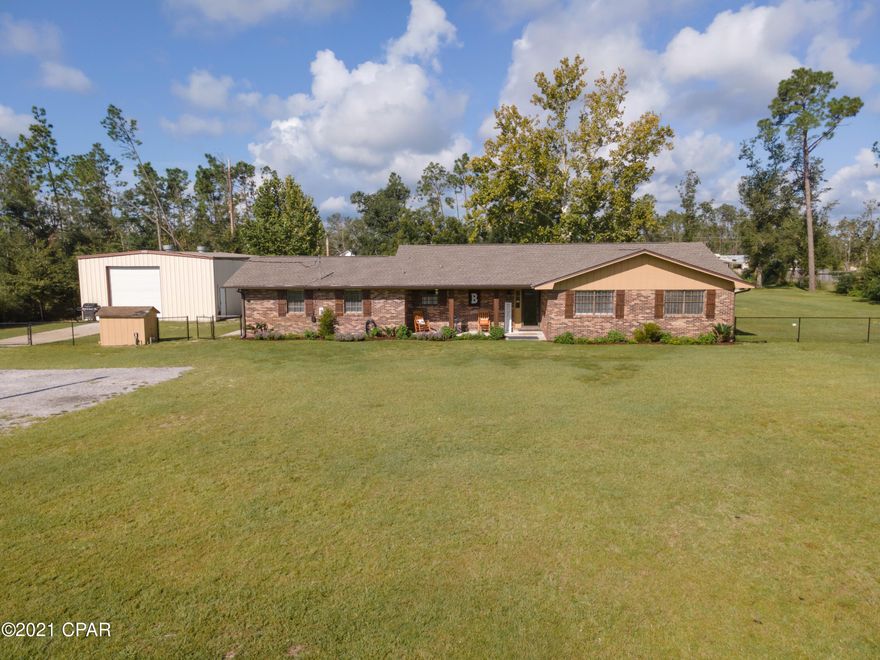 ***UNDER CONTRACT, ACCECPTING BACK UP OFFERS*** 

Come see this beautiful, newly updated 4 Bedroom, 3 full bathroom home on 2 acres! This large family home has many updates inside and out! The newly updated kitchen offers new shaker style cabinetry with soft close drawers, butcher block countertops, white subway tile backsplash, a farmhouse sink and stainless steel appliances. There is also a walk in Pantry! The spacious Formal Dining room boasts board & batten walls and a new chandelier. The large family room fills with natural light through the double French doors. Custom built in shelving throughout gives this farmhouse additional storage. With a split floorplan, the home offers an HUGE master suite with farmhouse updates such as barn doors, shiplap walls, and window trim. The master bathroom was completely updated with new tile custom glass shower doors, a vanity, and farmhouse light fixture. The 3 remaining bedrooms are just down the hall from the family room. The back guest bedroom has its own private, full bathroom and is oversized. Have your friends over for Game Day and entertain outdoors on large back porch with extended patio or in the Sunroom. There is an enclosed red steel metal building with concrete floors, a new roll up door, LED lighting, electricity & plumbing. The new pole barn at the back of the property provides additional coverage for your ATVs, boats, and tractors! Outside of the enclosed building there is a 60 amp connection for a Camper or RV. Bring your boat, ATV and other toys because there is plenty of room to store them! The coated chain link fence was installed in 2020 as well as the sprinkler system at the front of the home. 

Don't miss out on this beautiful home with so much to offer!! 
Call a REALTOR today to schedule a private tour. Please verify all measurements, if important.