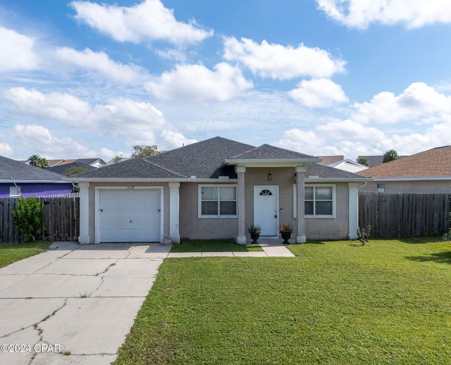 'CURRENTLY UNDER CONTRACT, SELLER WILL CONSIDER BACKUP OFFERS' Venetian Villa home offering three bedrooms, two baths, an open floorpan with bonus room and storage from the converted garage. There's an 8' by 21' concrete patio and a backyard that won't disappoint. Home is across the street from the bay.  The roof was replaced in 2018 with dimensional shingles and has hurricane clips. Appliances and 4 year old GE washer and dryer convey with sale. The flood insurance policy is transferable.  The home has good bones and needs TLC.  This is a great opportunity to make this home your personal residence or investment property.  Buyer to verify measurements if important.