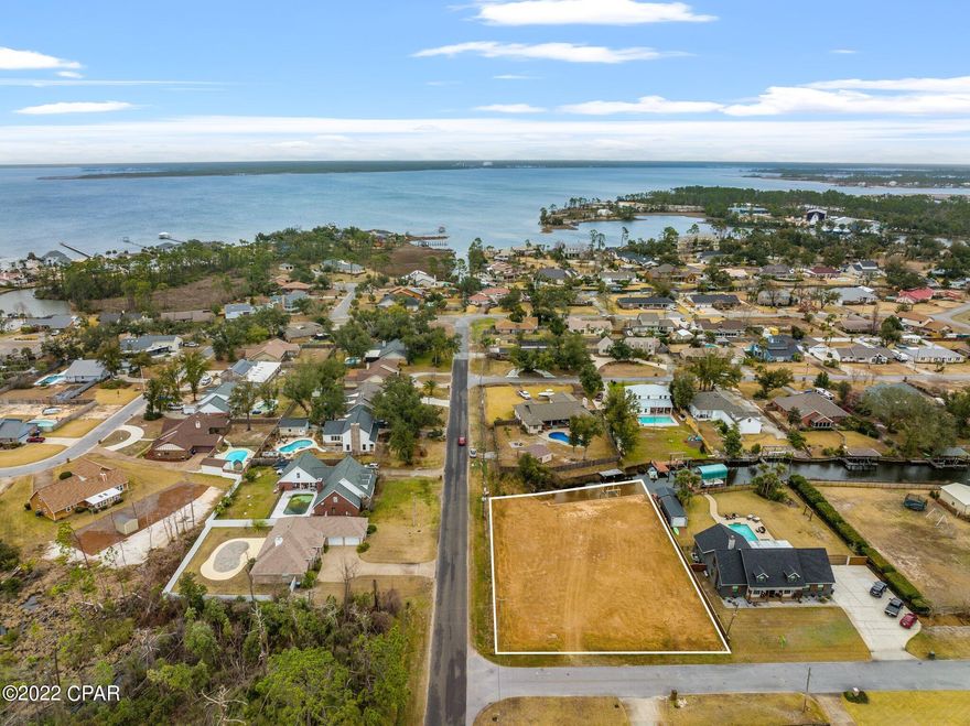 Huge corner lot in Kings Point neighborhood on the canal. New seawall in 2020. Build your dream home on the canal front property! Cleared and ready for you to build your dream home! 

Boat lift does not convey.