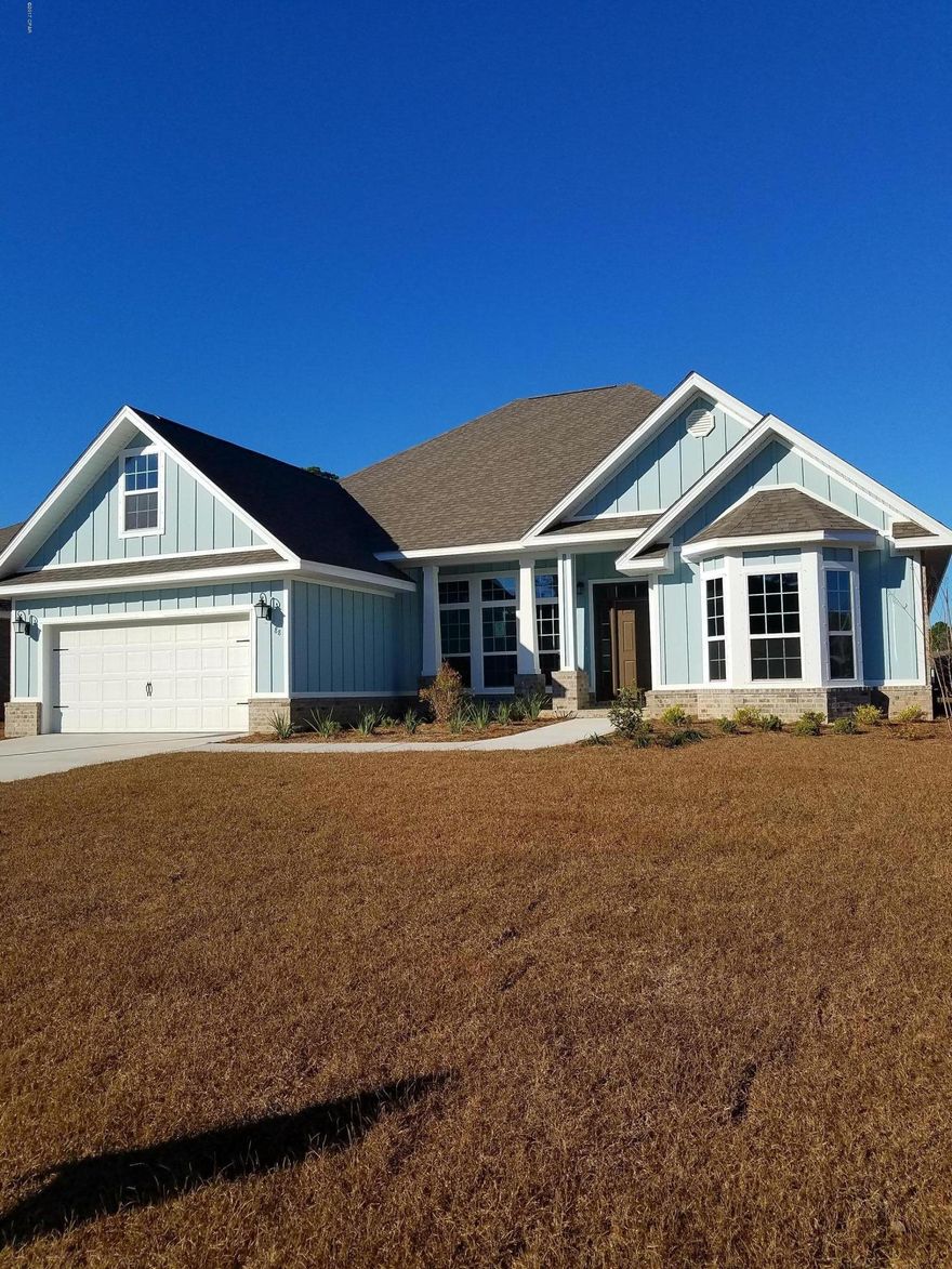 The Emma plan is  an open flow from great rm to kitchen. Covered patio bks to trees. Oversized granite island, loads of storage. Tray ceilings enhance volume at grt rm and master. Walk in closet, soak tub w separate shower located on opposite side of hm from additional bdrms. Office/flex room lightened by lg windows.Fanning Bayou is a natural and secluded setting surrounded by conservational habitat, yet within close proximity to shopping, dining, and the new Panama City International Airport. The neighborhood has a gorgeous pool house complete with a 5,000sf pool, open and shaded lounge areas, entertainment pavilion and green space. Pictures, photographs, floor plans, elevations, features, colors and sizes are approximate for illustration purposes only and will vary from the homes as bui