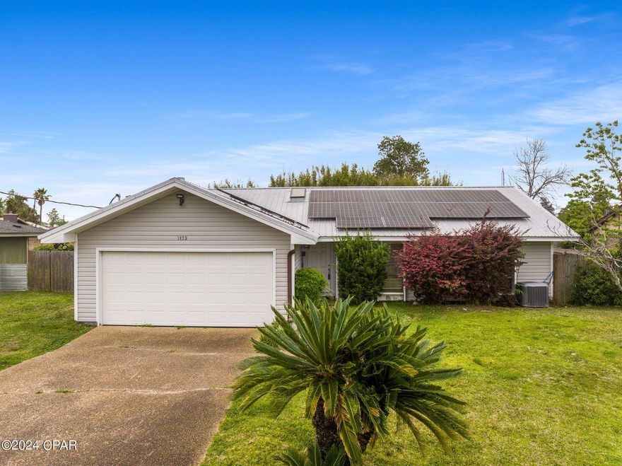 Welcome to 3133 Lawton Ct, a charming home nestled in the heart of Panama City, FL. Centrally located, this two-bedroom, two-bathroom home offers a delightful retreat for comfortable living.
As you approach the residence, you'll be greeted by its low-maintenance vinyl siding, ensuring durability and easy upkeep. Upon entry, you'll find a welcoming foyer with brick flooring, adding character to the home's entrance. Step inside to discover a well-appointed kitchen boasting granite countertops, a pantry, and a suite of appliances including a refrigerator, built-in microwave, oven/stove, and dishwasher. The kitchen is open to the family room, creating an inviting space for gatherings and everyday living. The family room features a vaulted ceiling and a cozy fireplace, perfect for relaxation during cooler evenings.
Sliding doors lead out to the expansive Florida Room, offering additional space to entertain guests or simply unwind while enjoying views of the in-ground pool and fenced backyard. Although not included in the square footage, this Florida Room adds additional living space to the home.
The two rear bedrooms have been combined to create an oversized master bedroom, complete with two closets. However, this layout allows flexibility for conversion back to two separate bedrooms if desired.
The large backyard is fully fenced with a gate and screened enclosure for the pool equipment, providing privacy and convenience.
This home is equipped with modern amenities, including a gas water heater installed in 2023, a 2018 A/C unit, a 2018 metal roof, and a new stackable washer and dryer. Additionally, there is a two-car garage with an opener for added convenience.
One of the standout features of this property is its solar panels, which will convey to the new owners with no balance due, offsetting monthly power bills and offering eco-friendly energy solutions.
Don't miss the opportunity to make this delightful residence your own. Contact your Realtor today to schedule a tour and experience the charm of 3133 Lawton Ct for yourself.