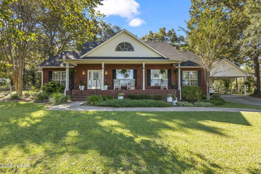 CURRENTLY UNDER CONTRACT, SELLER WILL CONSIDER BACKUP OFFERS

Introducing 2712 Marian Drive. Enjoy the peace and quiet in your own lake view home. Situated on a large 0.7-acre lot, this masterfully designed brick home is located in the desirable Dogwood Lakes Golf Community in Bonifay, Florida. A canopy of shade trees separates you from the first fairway allowing you excellent views while maintaining your privacy. This lovely quiet neighborhood has NO HOA! Enjoy your coffee on the covered front porch with views of the lake. Most days, you'll go for hours without a single car passing by your drive!  


This spacious all brick home features 3 large bedrooms, 2.5 bathrooms, a huge carport with attached workshop and over 2,700 square feet under roof! (2,203 SF heated and cooled). As you enter through the front door, you are welcomed by a beautiful foyer leading to the large living room, featuring vaulted ceilings and a wood burning fireplace. From the living room, double doors open to your large Florida Room with windows on all sides, bringing in lots of natural light. From the living room, access the eat-in bar connecting the kitchen to the dining area. From the dining area, you will find a separate room perfect for a home office, den or formal dining room. In the kitchen, wood cabinets and the dark solid surface countertops go perfectly with the built-in black appliances including gas burning stove, in-wall oven and microwave. The laundry room attached to the kitchen offers convenience and ample space for storage and stackable modern washer and dryer, which are included with this home.  


The huge master bedroom on the west end of the home opens to a large master bathroom, featuring a doubly vanity, walk-in shower, a separate relaxing jetted bathtub and a big walk-in closet. The additional two large bedrooms are on the other side, at the east side of the home, with shared access to another full bathroom. a seperate vanity between the two bedrooms you with the convenience of a jack-and-jill style bathroom with ideal privacy in a shared space. A recently updated powder room is located off the foyer at the entry, perfect for guests!  


With a huge yard in a quiet neighborhood, you will fall in love with the peaceful tranquility of this golf course home in Bonifay. The backyard is fenced in with gates on each side. The oversized double carport connects with a gate directly to the deck and back yard. Plenty of room for your cars and toys. Entertain outdoors with a mounted outdoor TV under the shade of your open carport. The enclosed workshop attached to the carport makes a perfect man-cave. With 0.7-acres, you have plenty of room in the side and back yards to spread out, add a pool, workshops and more. Updates include a new roof, water heater, new deck and more. Talk to your favorite agent today about a full list of updates and features Schedule your private showing to see this beautiful home for yourself.