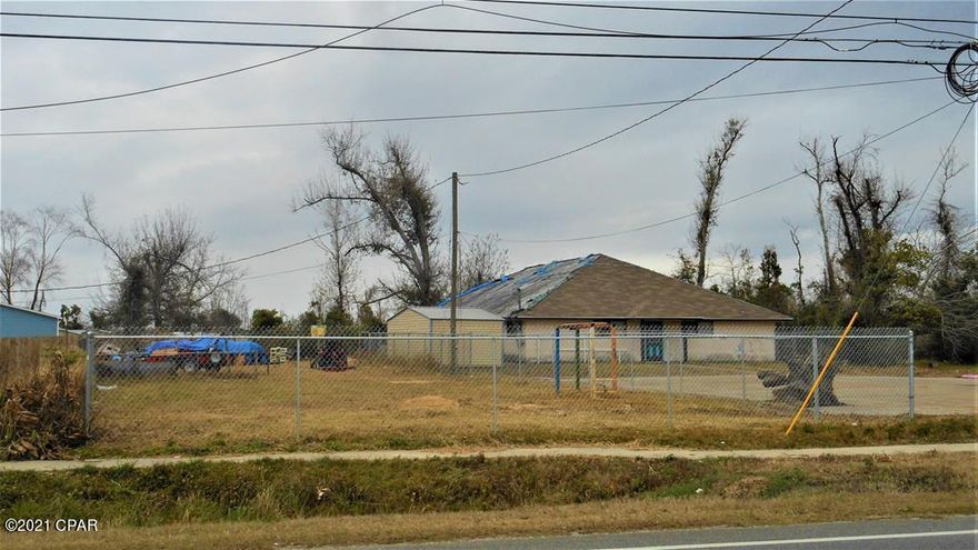 CURRENTLY UNDER CONTRACT SELLER ACCEPTING BACK UP OFFERS.  Zoned ''Mixed Use'', which creates tons of opportunities with this property.  This was a fully operational child care business known as KidLogic Early Learning.  Property has hurricane damage, needs new roof, interior needs to be gutted down to the studs.  Large lot 124'x248' or .71 acres, fenced yard and concrete parking lot.  Property is on city sewer and water.  Flood zone X.