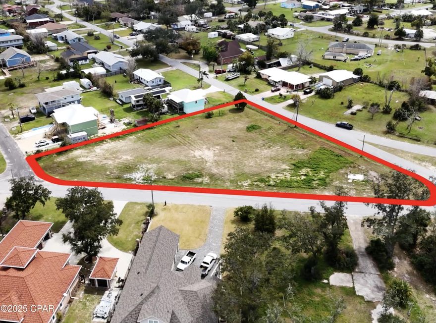 Build your dream home just steps from the Bay! This oversized .80-acre parcel sits in a prime Panama City location with three sides of road frontage and plenty of room to design the lifestyle you want. Imagine morning coffee with Bay breezes and quick access to boat launches just minutes away. Students, faculty, or investors will love the convenience of being near FSU Panama City and Gulf Coast State College, while the world-famous white sandy beaches of Panama City Beach are less than a 20-minute drive. With utilities available, no HOA, and the flexibility to design a single residence or explore subdivision potential, this property offers the perfect blend of location, lifestyle, and opportunity. This location is perfect for short term rental investors such as AIR BNB who want to capitalize on the growing demand for vacation properties. With easy access to local amenities, fine dining and shopping.  Don't miss your chance to be apart of this thriving prestigious neighborhood.