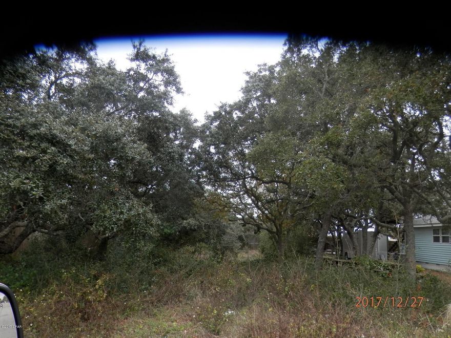 Nice building lot with shrub oaks just about 2 blocks to the gulf. Access from Front Beach as well as middle beach. Close to Hutchinson Beach School.