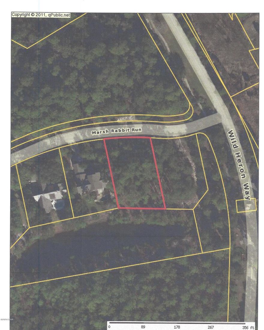 Remarks: : Beautiful large wooded residential Lot in Exclusive Gated Wild Heron Community, alongside Lake Powell, in Bay County, FL. Located only minutes from the ''World's Most Beautiful Beaches and is conveniently located between Pier Park and the many attractions of 30A to the West. Enjoy the many amenities in Wild Heron, Golfing, state of the art fitness center, pool & hot tub, boathouse, boardwalks along Lake Powell, sidewalks, and many nature trails to explore. Don't miss the Shark's Tooth 18 hole Golf Course for membership and the Har-Tru Hydrocourt Tennis Courts.