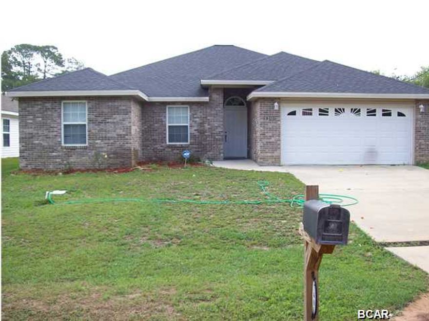 Nice open floor in this split floorplan brick home with 4 bedrooms and 2 full bathrooms.  Large, open living room features a gas fireplace and plenty of room for oversized furniture.  Master bath has 2 walk-in closets and new double vanity.  The house has a new drain field and lift station as well as some new flooring.  The first 14 pictures are of the home unfurnished, the rest are with the tenants belongings.  The flooring in the living room and master bedroom has been changed to new LVP.