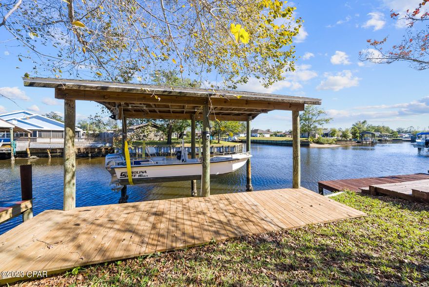 Welcome to your waterfront retreat! This stunning townhome offers the combination of a beautiful interior, convenience, and endless water adventures. With direct gulf access, a boat house and lift, this is a boaters dream.

Step inside and be greeted by a warm electric fire place, all new kitchen appliances, new windows, lighting, and more. 

As you make your way upstairs, you will find 3 spacious bedrooms with one overlooking the canal. 

Outside, indulge in the ultimate waterfront lifestyle. The boat dock and lift make it effortless to access the gulf whenever you desire. Spend your days fishing, cruising, or simply soaking up the sun on your private deck. 

Don't miss out on the opportunity to own this waterfront gem in the heart of Panama City. Whether you're seeking a permanent residence of or a vacation getaway, this townhome offers it all. Call me today for your private tour!
