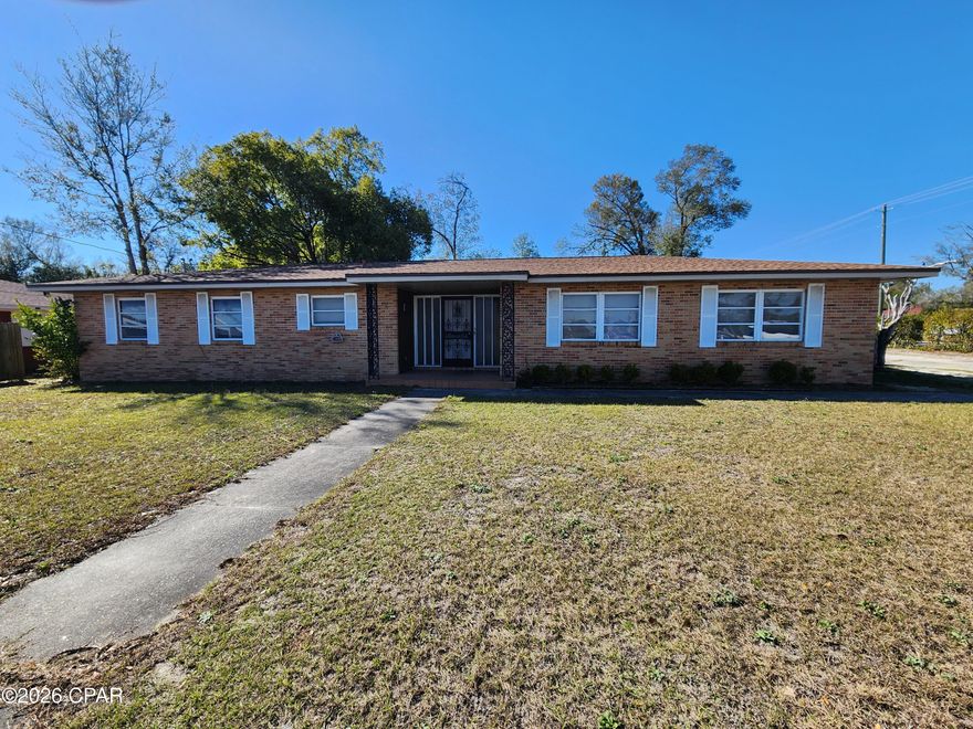 Spacious all-brick, three bedroom, two and a half bath home just minutes from downtown Panama City. The home has a 2019 roof and a 2016 HVAC The home also has a large living room/dining room combination in addition to a family room. The master bedroom has double closets and the master bath is tiled with double vanities. There is a single car garage and large storage area with a half bath off of the garage and a large driveway for extra parking. The home needs some work after being a rental for some time so bring your vision for this spacious home on a large lot.