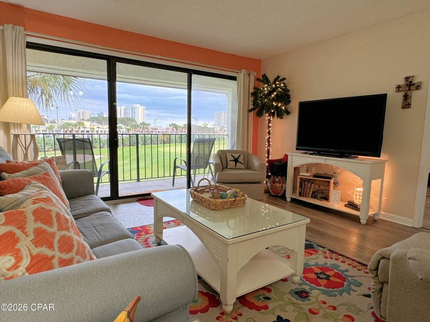 Golf Villa 1212, located within Edgewater Beach and Golf Resort, is a second-floor condo offering solid rental potential and access to a full range of resort amenities. The property may be used as a primary residence, secondary home, or rental investment and is priced competitively for the market.
The condo features floor-to-ceiling windows, a functional open layout, vinyl plank flooring throughout, and spacious bedrooms. A new HVAC system has been recently installed.
The owner's suite includes a king bed, en-suite bathroom, and balcony access. The private balcony overlooks the golf course (hole 7). The guest bedroom accommodates two full beds plus a nightstand and has an adjoining bathroom.
Enjoy access to a heated Villa pool, a nearby tram stop providing transportation to the beachfront area, and all Edgewater Gulf-front amenities. These include beach access, pools, hot tubs, a poolside bar, year-round dining at Ocean's restaurant, and an on-site market offering Starbucks, ice cream, and convenience items. Additional amenities include a fitness center, golf course and pro shop, tennis, pickleball, basketball, shuffleboard, children's activities, and a staffed security gate.
Pet-friendly areas, sidewalks, an over-the-street crosswalk to the beach side of the resort, and EV charging stations are available. Shopping, dining, and entertainment are within walking distance, with Pier Park and the dog-friendly beach just a short drive away.
Three pieces of artwork shown in photos do not convey with the sale.