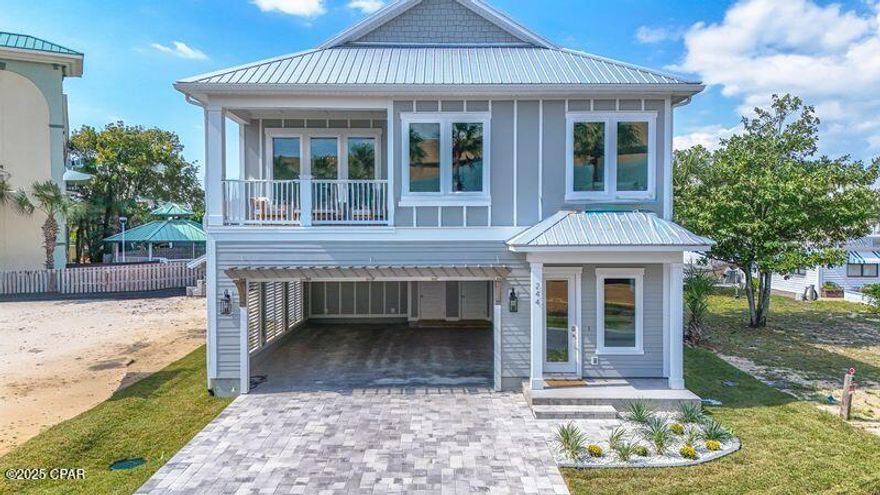 PRICE IMPROVEMENT !!! REDUCED BY $50,000 dollars. Exquisite New Construction Coastal Retreat - Fully Furnished
Discover this beautifully crafted coastal luxury home, located on the highly desirable West End of Panama City Beach—just steps from the Gulf's most beautiful beaches. Completed, fully furnished, and tastefully decorated, this residence offers both a serene retreat and exceptional income-producing potential. This 5-bedroom, 4.5-bathroom home spans two stories with parking for 6 vehicles and designed for both comfort and sophistication. The chef's kitchen is a true showpiece, featuring upgraded stainless steel appliances, including a French-door refrigerator, gas cooktop, dishwasher, wall oven/microwave combination, and washer/dryer. Custom 42'' white shaker cabinetry, quartz countertops, and a spacious walk-in pantry complete this gourmet space.
The open design flows seamlessly to outdoor living with a 12'x24' private saltwater pool, gas-heated for year-round enjoyment. Additional highlights include:

    •    Gas tankless water heater

    •    Hurricane-impact rated windows

    •    Durable metal roof & Hardie siding

    •    8' interior and exterior doors

    •    10' ceilings on both levels

A spacious game room offers views of the pool, while multiple living areas provide plenty of space for entertaining.
Conveniently located within walking distance to the pristine white-sand beaches, and just minutes to 30A, Pier Park shopping, dining, entertainment, and a short ride to local grocery stores, this home is the perfect blend of luxury and convenience. Whether as a private coastal escape or a high-yield vacation rental, this home presents a rare opportunity on the beautiful West end.