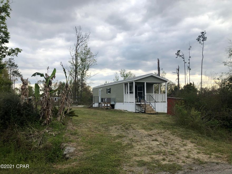 Back on the Market & Ready to Close! Move in ready. Located in the rural town of Wewahitchka this home is very close to many nearby boat ramps for fresh water fishing on the Dead Lakes or the Apalachicola River, with many small mom & pop shops in town. Located 30 minutes from St. Joe or Panama City. This home is still in brand new condition.