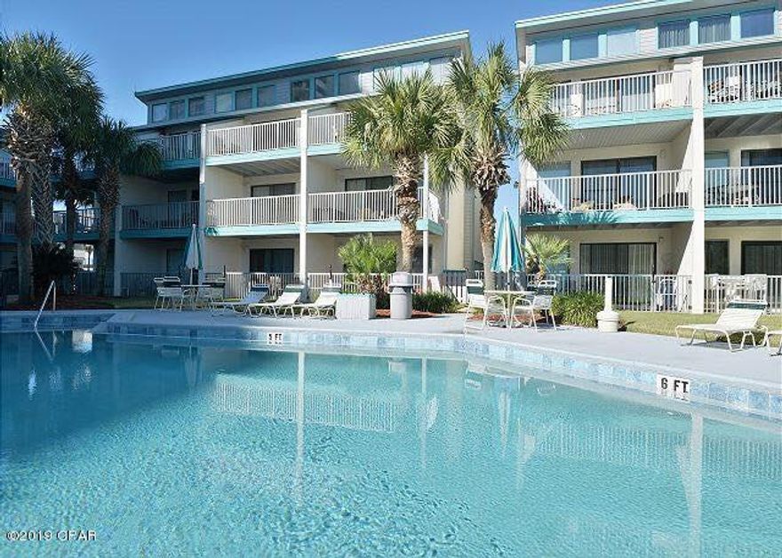 Nautical Watch is a Gulf front complex. There's no busy street to cross getting to the surf, sand and sun! Your new condo's balcony (unit is on second floor) overlooks a beautiful pool courtyard that . is seasonally heated. This is a great beach get-away, vacation rental, or full time residence. The building has a new roof and the sheetrock removed for water mitigation will be replaced by the HOA. You're only two miles from St. Andrew's State Park.