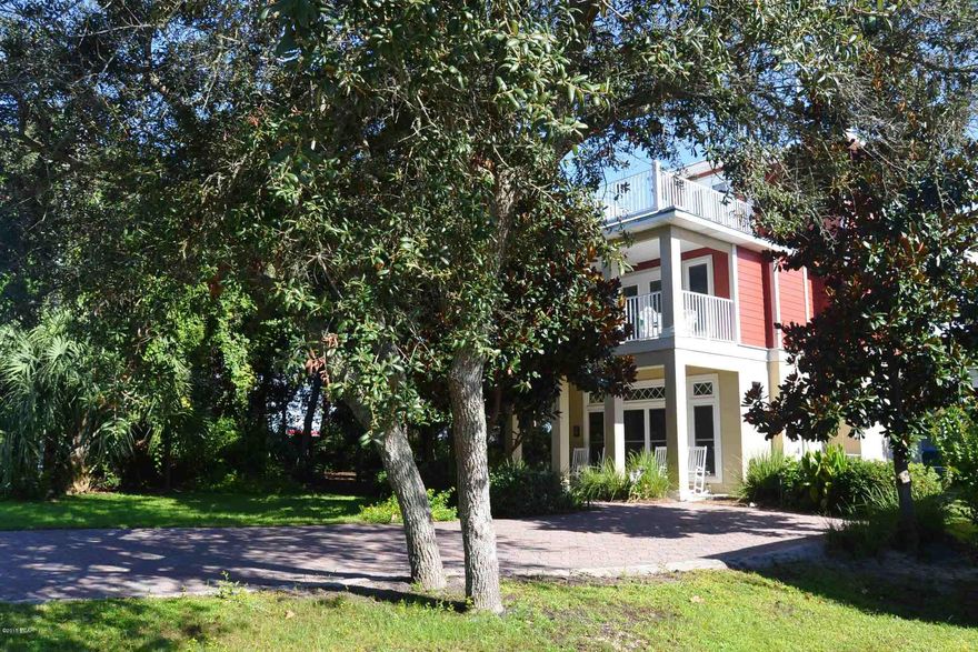 **PRICE REDUCED TO SELL!**This 3 bedroom 3 bath home is absolutely beautiful and being sold furnished!. The home is located less than 1/2 mile from the ''Worlds Most Beautiful Beaches'' and 1 mile from Pier Park. El Centro Beach Community is golf cart friendly making it quick and easy to get to the beach. As you enter the home you will immediately notice the upgraded hardwood floors, solid surface counter tops, slate back splash and the stainless steel appliances. On the first floor is your main living/dining area, gourmet kitchen one bedroom and one bath and laundry room. On the second floor is your master bedroom/bath with its private balcony, the 3rd bedroom with its own private balcony and quest bathroom. The third floor is a perfect get-a-way with a wet bar and a large private balcony