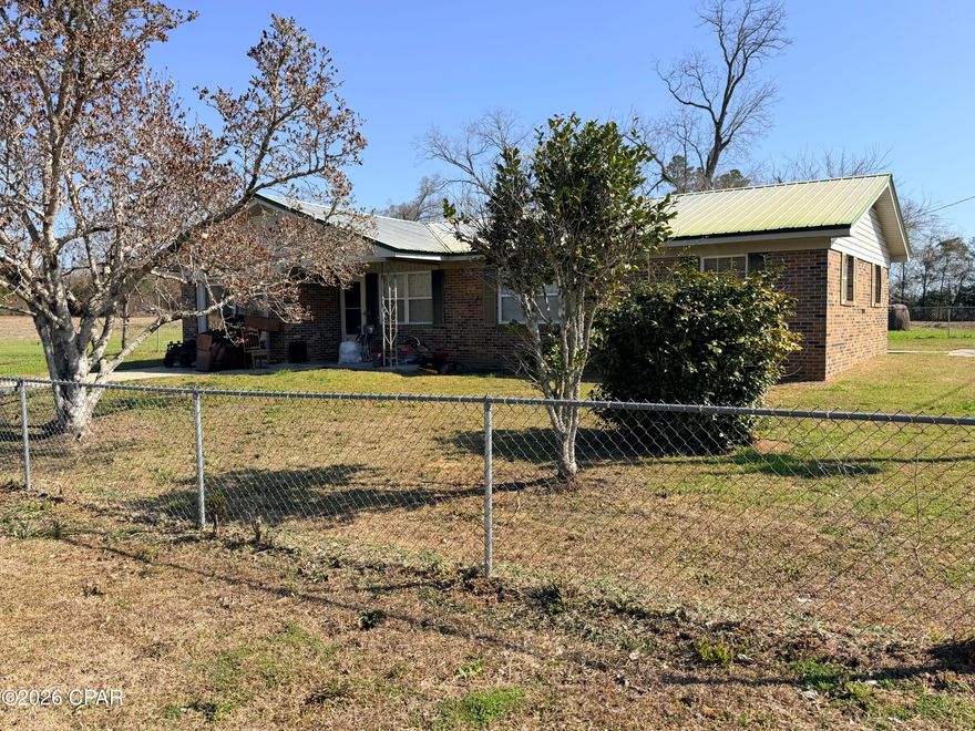 Welcome to peaceful country living just minutes from town! This solid 3-bedroom, 1-bath brick home sits on a beautiful 1-acre lot in Marianna, surrounded by wide-open fields and quiet scenery.



With 1,325 square feet of living space, this home offers a practical layout, a metal roof, and a full walk-in shower for easy accessibility. The brick exterior provides low maintenance, while the spacious yard gives you room to garden, entertain, or simply enjoy the privacy and open views.



Whether you're a first-time buyer, downsizing, or looking for a smart investment, this property offers incredible value at an unbeatable price.



Homes at this price point don't last long — schedule your showing today!