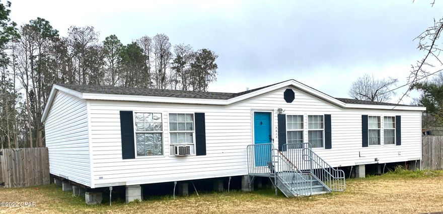 Well Maintained 3 bed room, 2 bath on a large lot.  Large master bath with double vanities.  Large bed rooms with walk in closets. Back porch extends the entire length of the house.  Privacy of the country with being minutes from much needed shopping and entertainment.