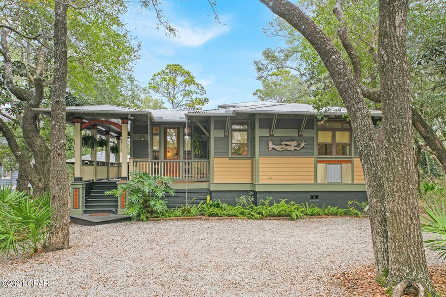 UNDER CONTRACT AND ACCEPTING BACK UP OFFERS. Welcome to Casa sul Canale! This custom-built home sits in a 300+ ft deep, heavily wooded, private setting on Western Lake canal; one of the largest lots on Canal Street. With its Old Seagrove location, it provides easy access to public beaches, Seaside, Watercolor, and 30A. This gorgeous home was carefully designed and built in the Craftsman style architecture with incredible attention to detail and quality craftsmanship. The main house showcases one-of-a-kind details: 200-year-old heart pine floors, doors and trim from New Orleans' reclaimed cypress, and stained-glass transom windows. Floor-to-ceiling windows flood the interior with light. A fireplace with wrap around mantle and hearth, custom window seats, and a tongue-and-groove vaulted ceiling highlight the living area.