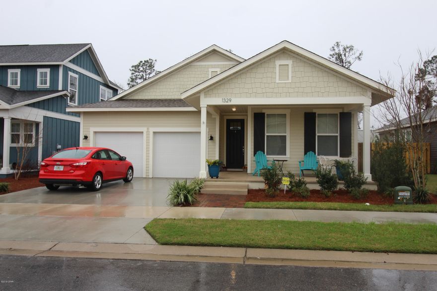 MOVE-IN READY. Beautiful Sweetbay Community home - amenities galore; trails/pathways, neighborhood parks, pools/bathhouse/rec area, bay access, and a future town center.  Charter School located within the community.  Open Floor Plan, Master in the rear and additional bedrooms/full bath up front for privacy.  Kitchen open to living and dining areas, with big windows/French doors leading to covered lanai and backyard.  Home backs to wooded area beyond privacy fence.  Granite countertops in kitchen/baths, wood like tile in common spaces, stainless steel appliances, Master bedroom with beautiful bathroom and huge walk-in closet, 8 ft doors, high ceilings and 2-car garage.  Reputable builder boasts of strong home building techniques/materials.