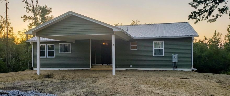 If you are looking for a great house with land, this is a must see! This home was taken down to the studs after the hurricane and the completed product is absolutely darling! 

The upper-level has three bedrooms, two bathrooms, an open floorpan, plenty of natural light and a giant deck off of the living room that is perfect for the cool fall nights! 

  The downstairs is an unfinished freshly sealed basement with a fireplace, HVAC, full bathroom and the rooms have already been divided. The only thing that is needed is your vision and drywall!

Cottage and storage on property as a convince and has no value