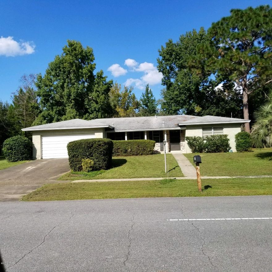 Huge home in a great location,this 4 bedroom and 2 1/2 bath On 2 lots.With limitless possibilities,home needs TLC and updates,but can be a show place with money spent and some elbow grease. Home is close to the church and a hop and skip to hwy 77.Call today for your showing . Will not last long.