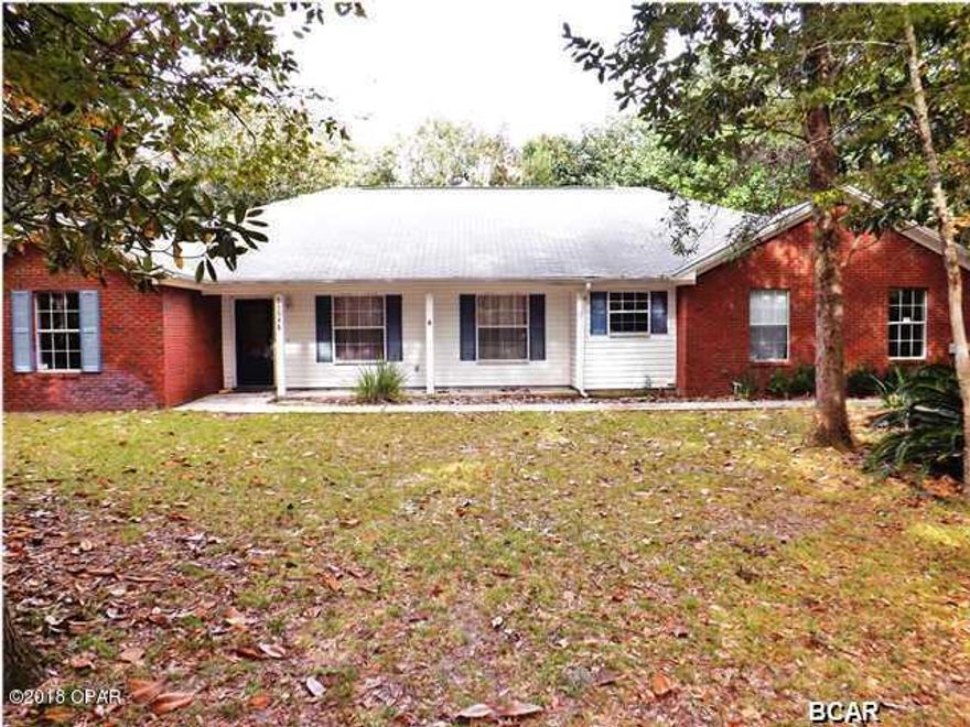 Great home sitting on almost 1 acre.  This home has a great floor plan, and as you are walking through the front door, you are greeted by a large family room with fireplace and Cathedral Ceiling. To the right is the formal Dinning room.  Ample kitchen with breakfast bar  overlooking the family room.  Wood laminated flooring throughout.  Split bedrooms with Large master and sitting room and Trey Ceilings.  Walk in Closets and Jacuzzi.  Easy access to fenced in back yard with French Doors located in Master Bedroom, Living room and guest room  Back patio is fully screened in overlooking the gorgeous large yard for the kids to play.  Home sits on Septic and Well Water.   Large 2 car garage.  This home is priced to sell.