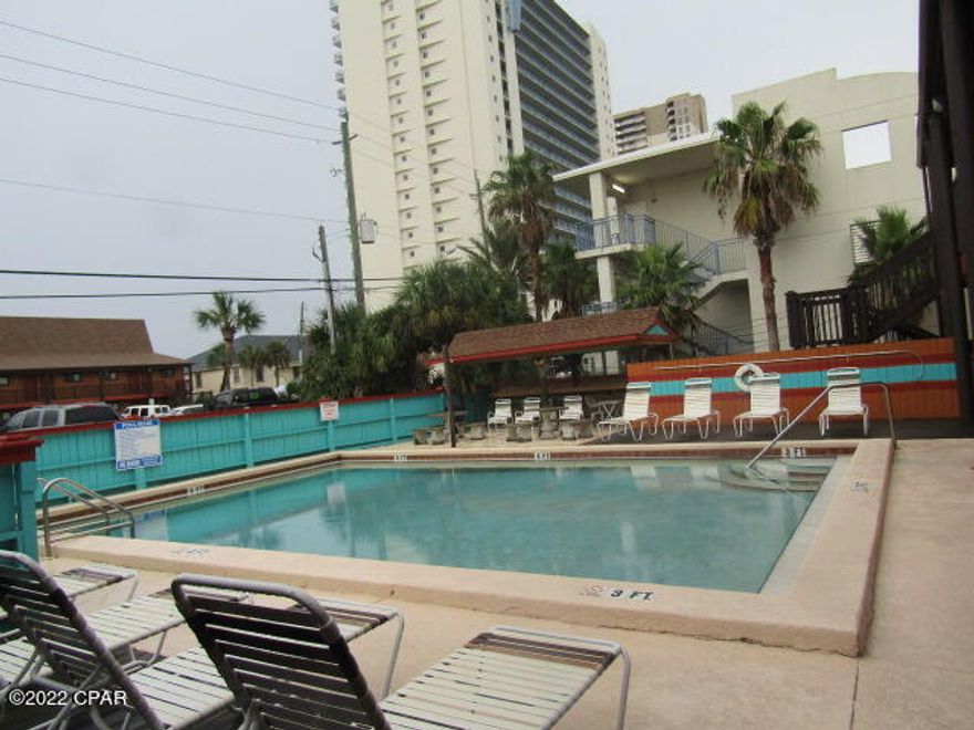 Polynesian - Walk To The Beach!  Cute 1 bedroom, 1 bathroom top floor condo on 2nd floor with covered balcony overlooking Lullwater Lake. Community Pool and coin operated laundry facility.  Water, sewer, garbage, basic cable, internet, pest control & ac filters are provided by the HOA.									

Only 2 occupants.