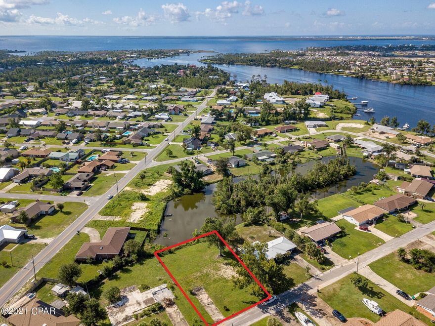 This waterfront property provides nearly one third of an acre with views of the Bayou. The property is cleared and ready for you to build.  Plumbing, Electric and a driveway are already in place. This property is centrally located to great schools, Tyndall Air Force Base, shopping and dining. Whether you're looking to build your dream home or an investment property is a must see. For more information give us a  call.