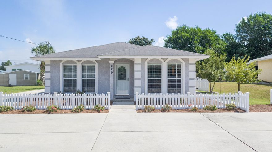 LARGE PRICE REDUCTION. Absolute Pristine condition. This is a gorgeous beach house with just a short walk to two beach accesses. The home is meticulously maintained with spacious master bedroom and Jack and Jill bathroom for the other two bedrooms. Laminate floors throughout and the painted walls are in excellent shape. The overall condition of this home is near perfect. Enclosed screened in porch, 2 utility buildings in the back yard with one being for a golf cart, Outdoor shower facility, lots of parking and a spot for a small RV or boat. The yard has very little grass for easy maintenance. The roof is in good condition. This house will be a pleasure to show.