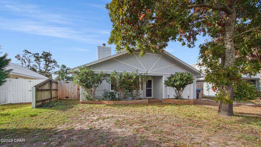 Adorable home in the Open Sands neighborhood! This 2 bedroom 2 bath home is less than 3 blocks from the beach. This super cute home has been well-maintained and features a one car garage, fenced back yard and a storage room just off of the patio.  Roof replaced in 2021 and new a/c in 2019.