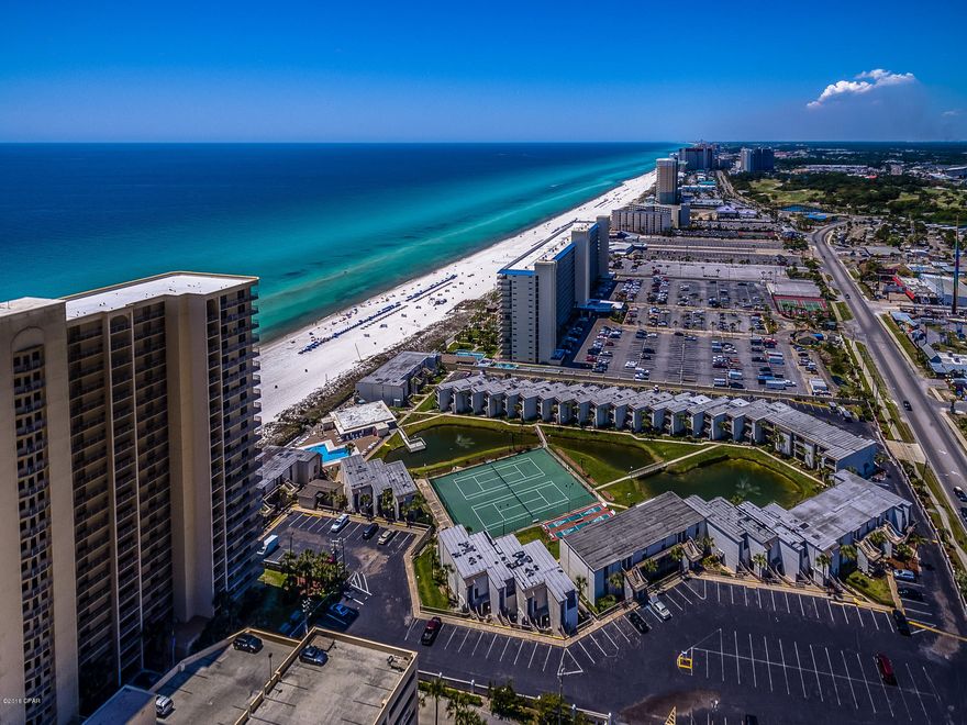 Sugar Beach is a beachfront community in Central Panama City Beach. This is a 1 BR/1 BA condo on the first floor with views of the tennis courts and lake. The kitchen was recently updated with stainless steel appliances and opens up to the dining/living room. Offered fully furnished! The dining/living are carpet and the kitchen/bathroom have ceramic tile. Master bedroom has carpet, and has new King size mattress. Tenant pays $1,200 per month with lease until October 31, 2018, Right to Cancel with 30 days notice. This is a turn key investment opportunity!