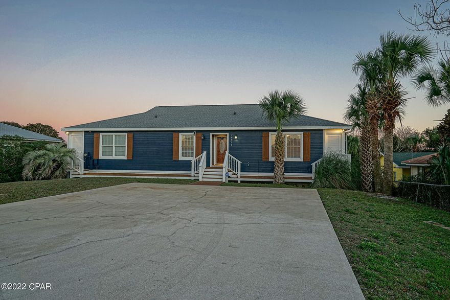 Looking for a second home or vacation rental big enough the the whole family?  Look no further!  This beautiful 5 bedroom 3.5 bathroom home has all the things!  It is double the fun with two kitchens; each with granite counter tops and stainless steel appliances, two large living areas, two master bedrooms with walk in closets and two laundry rooms!  Out back you can sit poolside overlooking  your private lake front setting.  All this, AND you are just blocks to the beach!  Rental projections are in the 85-95k range, but definitely has the potential to do more!  This home comes fully furnished with some exclusions.  Also, the roof was just replaced in December 2021!  No insurance issues.  You really need to add this to your must see list.  Call today before it is gone!