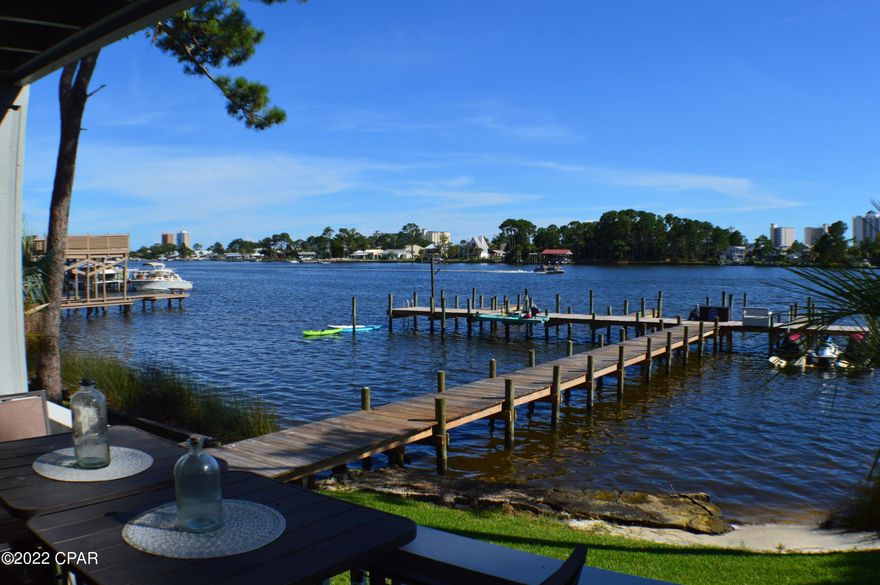 This is a once-in-a-lifetime deal!! Quality and gated waterfront condos on the north side of the lagoon with boat slip and dock access (and only a few short minutes to the Gulf of Mexico) are in high demand. Your research will tell you there are hardly any left on this beautiful lagoon. This awesome, cozy, and very quiet condominium (only 23 units) will guarantee your next vacation home is a sure thing. Fully furnished and ready to move in today! Beautiful summer sunrises and sunsets eagerly await you.  DON'T MISS OUT!