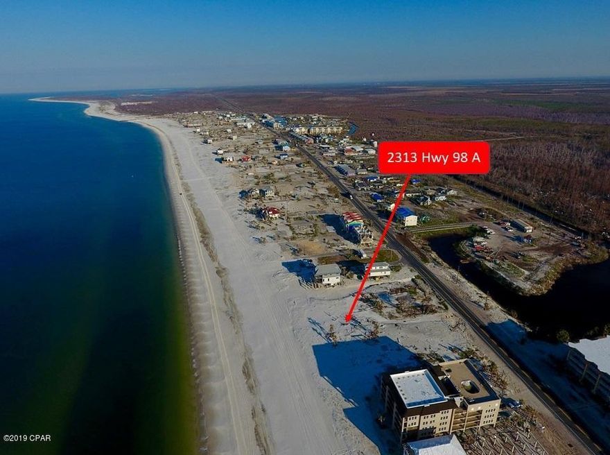 Gulf Front Lot measures 25' water front by 140' . Beautiful glistening white sand beach and amazing sunsets every evening. There was once a duplex on this property that was destroyed by Hurricane Michael. Would need to build back a duplex along with neighboring attached property. Total lot size is 50 x 140 with each side having 25' . Verify with City Building Department .