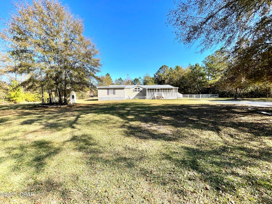 Tucked away down a peaceful road in the rural area of Holmes County is this nice home on almost 3 acres. 

This home has 4 BR 2BA ,a large living area and dining area for plenty of entertaining. If you are looking for a huge kitchen with plenty of counter space and cabinet space then this is for you also.  New roof, New HVAC, New appliances & New Front porch. Walk out your dining room onto a beautiful deck with a pool.  Get up with your favorite realtor to view this property.