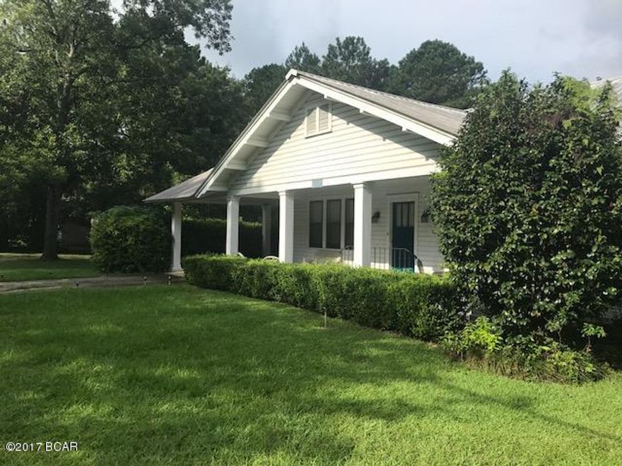 Nice Larger home in town. Road frontage on 2 roads with oversized detached garage. Home has orginal hard wood floors with high ceilings. large kitchen with abundance of cabinets.