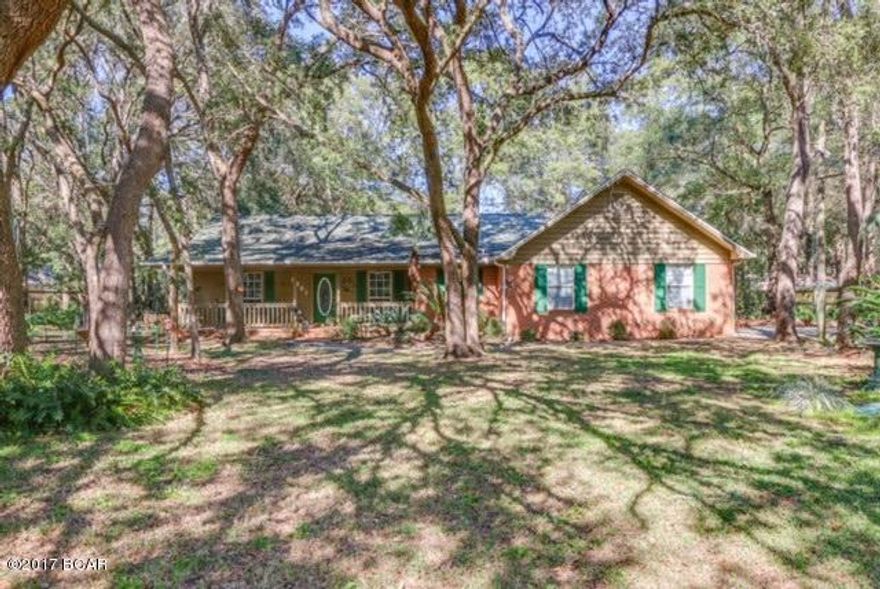 Immaculate 3 bedroom 2 bathroom home.  Bright Florida room,large beautifully   landscaped yard.Close to excellent schools and DEERPOINT Lake.Very friendly, safe, family oriented neighborhood with access to the public boat launch just down the road.Excellent place to ride your bike & walk your pets. Close to town & beach yet still has that ''country'' feel.It's a must see!