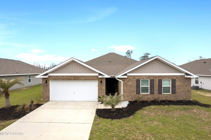 If you're looking for your perfect forever home - this beautiful, open concept home has it ALL!  The oversized lot has no neighbors behind you and plenty of room to add a pool, pergola and so much more! You don't have to sacrifice a large yard when choosing THIS home. You're sure to enjoy your covered patio on a relaxing day, rain or shine, without the view of another home. The seller has tastefully added extra touches to the kitchen, to include, custom painted cabinets, tiled back splash, pendant lighting in the dining area and upgraded stainless steel, Samsung smart home appliances. Yes, your range will come complete with Wi-Fi AND Air fry mode settings!  This home sweet home has ample storage space, cabinet space and a good-sized pantry. The bonus coffee/bar area is the perfect setting when gathering with family and friends. The primary bedroom is large enough for your king suite furniture and the ensuite provides a spa retreat atmosphere with its spacious garden tub, separate shower, double vanity, private water closet, beautifully frosted large window over the tub and a spacious, walk-in closet most people beg for! Three guest rooms, full bath and large laundry room are positioned on the opposite side of the home, giving everyone a little space of their own. The seller has had the home freshly painted and thoroughly cleaned inside and out; so it's READY, SET, GO!  New gutters and palm trees have been added to help boost your landscaping. This home is equipped with a top-of-the-line smart security system, including shatter sensitive window sensors and fire alarm monitoring, which may help reduce your home insurance! The popular Magnolia Hills neighborhood is centrally located between Tyndall AFB and Panama City Beach. It's on the edge of town but right in the middle of all the conveniences. Seller is generously providing a 1-year home warranty for buyers peace of mind and survey is available for use. Ask your agent for a full list of upgrades! Your forever home awaits you! 

Measurements approximate, buyer to verify if important.