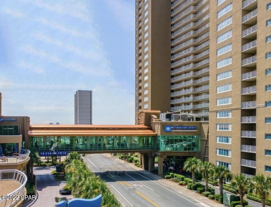 CURRENTLY UNDER CONTRACT, SELLER ACCEPTING BACKUP OFFERS'Rental projections provided by Nautical Properties at 70K. Gorgeous 2-bedroom/2 full bathroom, plus hall bunks, beachfront condo. This large unit is in one of the most desirable buildings in Panama City Beach. Beach chair set up is done for you, water toy rentals onsite,  activities, and Wi-Fi and cable are included in the HOA. This is truly ''don't lift a finger'' beachfront home ownership at its best! Home is currently set up with a king bed in the master and queen in second bedroom, however these rooms are huge and can easily fit 2 queens per room. With the hall bunks and new pull out couch, this unit can comfortably sleep 12 people! Brand new stainless steel appliances, new paint throughout the entire unit, new curtains, newer fl Home is sold fully furnished, family room furniture including sleeper sofa are in like-new condition. Multiple pools throughout the property (heated seasonally), tiki bar, sky bar, game rooms, fitness center, onsite Starbucks, restaurant and cafe, all within a very short distance to bars and restaurants of PCB including Pier Park. Feel the Gulf breeze in your living room and master bedroom just one time, while watching the sunset, and you'll know this is a once in a lifetime opportunity.