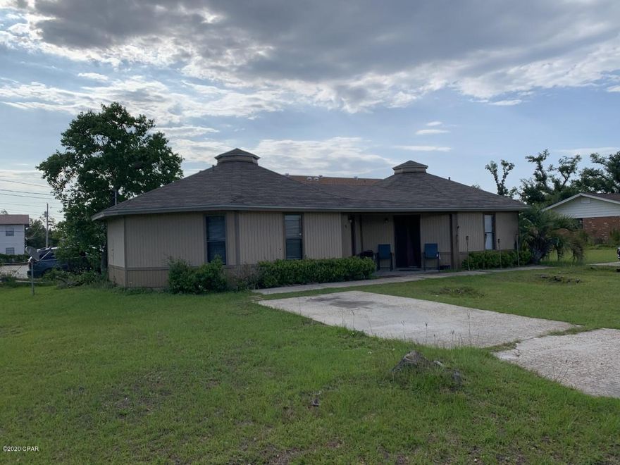 This quaint 2 bedroom 1 bath duplex unit is located in the Springfield area directly across from Rutherford High School and is ready for occupancy.  This unit features vaulted ceilings in the living/kitchen/dining room(s), and all tile floors.  There is also a large open yard and concrete parking for two vehicles. The listing agent and owner of this property is a licensed Florida real estate agent.