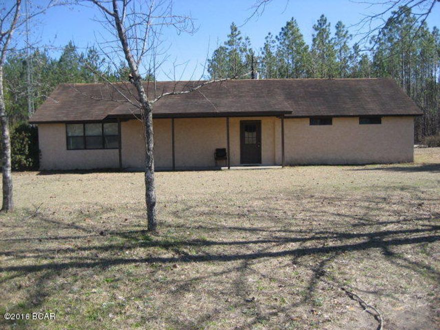 $112,000. This is a block/stucco home with 3 BR's, 1 bath, large living/dining room combination, kitchen, and laundry area in kitchen. The home has 1,560 sq. of living space with electric central heat & air, some tile floors, and some indoor/outdoor carpet. Kitchen comes with refrigerator, stove/oven, and dishwasher. All window treatments remain. Owner might consider holding some short-term financing, if needed. The 8.36 acres of level ground is an irregular-shaped parcel, but it has 864.87' of frontage on C.R. 19. There is also an oversized workshop/storage building on the property that would make a great place for housing farm equipment of for the person who likes to tinker outside. Located just 30-40 minutes from the Gulf of Mexico, in the NW Florida panhandle. Make plans to see this one soon. $112,000.