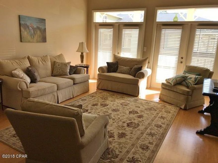 Enjoy island living at this beautiful condominium complex.  This beautiful unit has upgraded Samsung appliances only two years old, thermostat that can be monitored remotely, upgraded shelving in closet, new carpet and more.  First unit, close to garage with courtyard view.  Island Reserve amenities include large one-acre lagoon style pool, recreation room, basketball court, gym, and media room. Some furnishings for sale.  Contact listing agent.