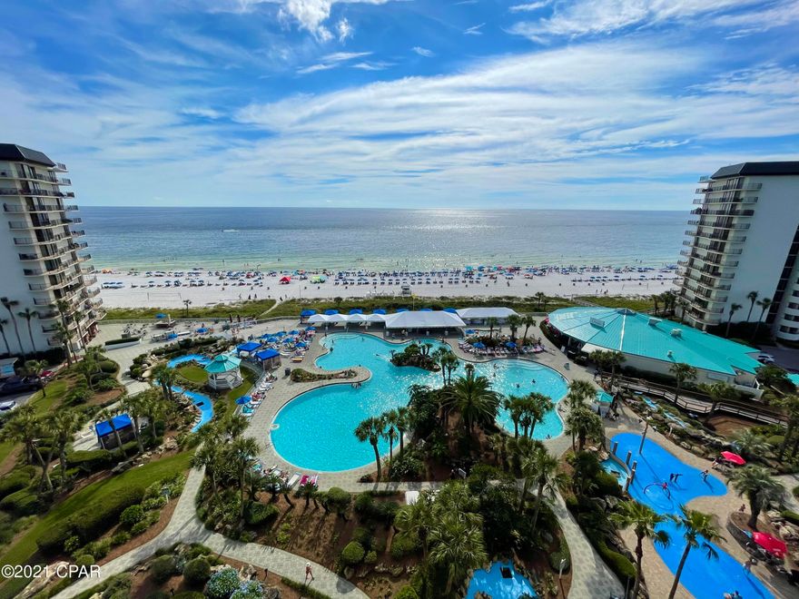 Updated Beachfront Condo for sale in largest PCB resort with the most amenities! In demand, rental ready 2-bed 2-bath. You will love the private beachside balcony full of coastal breezes and sounds of the surf. Pet friendly for Owners. Close to heated tower pool and all beachfront amenities including the huge lagoon pool. Enjoy Private Beach Access, Tropical Pools, Hot Tubs, Sun Decks. Restaurant, Poolside Bar, Market, Pizza Shop. Kids Club with Splash Pad & Activities. Owners play unlimited Golf, Tennis, Pickleball, Shuffleboard. Gym & Salon Services. Gated Entrances, 24-hr Security. Walk to dining, entertainment, shopping across street.