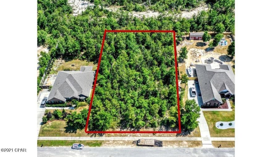 136 Lake Merial Trail, cleared, high and dry, and ready to build on. Lake Merial is a gated, private community with access to gorgeous spring-fed, 300 acre Lake Merial. Low inventory of homes, take the opportunity to build exactly what you want in one of the best communities, gated, quiet, serene, safe to jog, walk, bike, and enjoy life! Lot measures 110x226, Don't let the opportunity pass you by, Lake Merial only has a few lots left, come visit today!