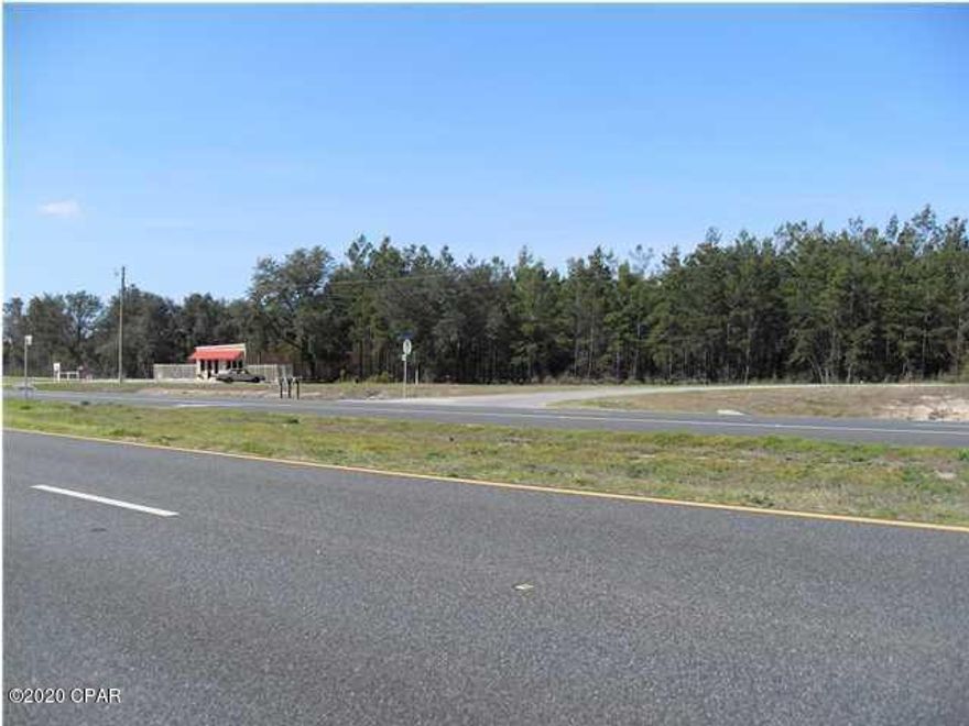 3.53 acres of commercial zoned property located on Hwy 77 about 1 mile from Deane Bozeman High School and 16 miles from the Northwest Florida Beaches International Airport.