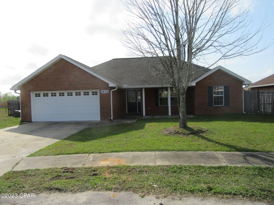 Very attractive 3 bedroom 2 bath low maintenance brick and vinyl construction home is conveniently located in the desirable Magnolia Meadows Subdivision in Lynn Haven. Carpet and ceramic tile, spacious white kitchen with a dining area, ceiling fans, ample closets, laundry room. Living area is a very large open space with a fireplace focal point covered porch, Tray ceilings a 2 car garage with attic access and storage. Situated on a very large lot/cul-de-sac, with yard storage as well. All property sizes and ages are approximate, please measure and/or verify if important. School assignments are subject to change, please check with Bay County for most accurate information. Deposit is the same as one month's rent. Pets allowed with breed restrictions.