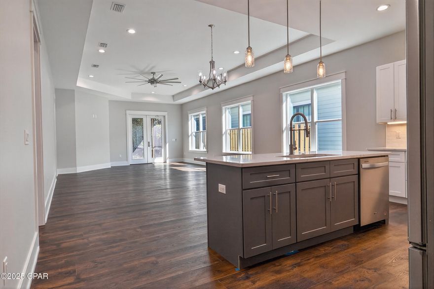 New home by one of Bay County's most awarded, celebrated Builder's, Koehnemann Construction. Located in the gated Sanctuary Beach community is this 3-bedroom, 2 bath single story home with 1,917 sq ft. Home has a large open kitchen, pantry, stainless steel appliances, low maintenance luxury vinyl plank flooring throughout, a screened in back porch and a 2-car attached garage. The community has a dedicated nature trail that leads to the water on St. Andrews Bay. Sanctuary Beach is conveniently located off Thomas Drive with shopping, dining, entertainment and outdoor recreation just minutes away.