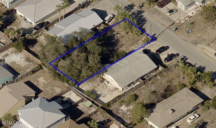 Seller said to Move it.!!! Just dropped the Price 115,000.00  Seller will also agree to have the two large trees removed as well.  Land is located in vacation rental area! Golf cart community, close to the beach, and other attractions. come build your New Beach House.